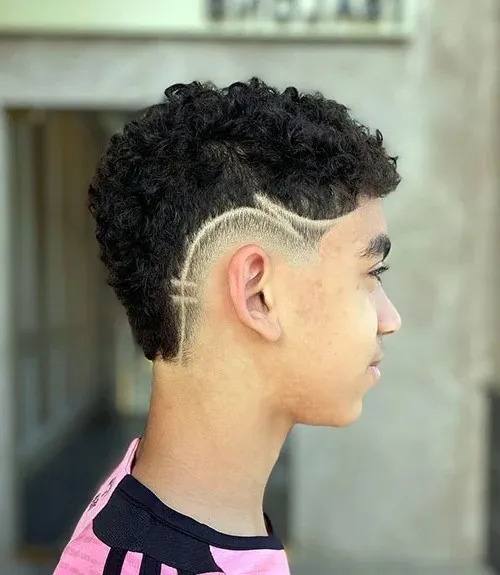 BURST FADE MOHAWK WITH LONG SHAVED LINES