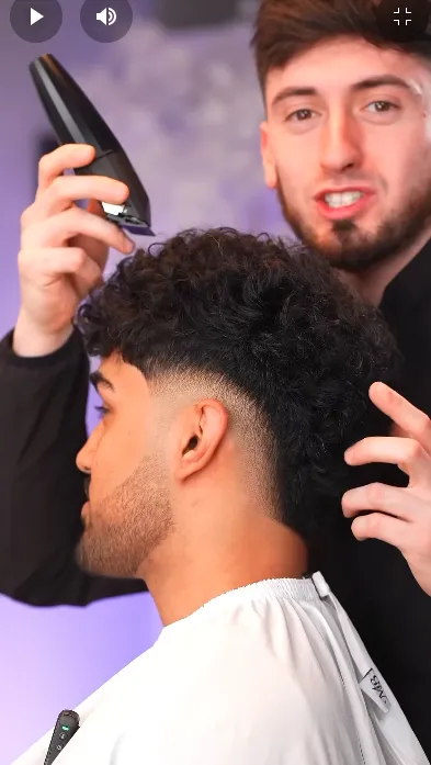 HAIRCUT LINES IN A MOHAWK FADE